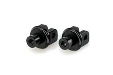 Load image into Gallery viewer, Black PUIG footpeg adapter for BMW motorcycle, part of foot controls, shown attached to the bike's footrest area.