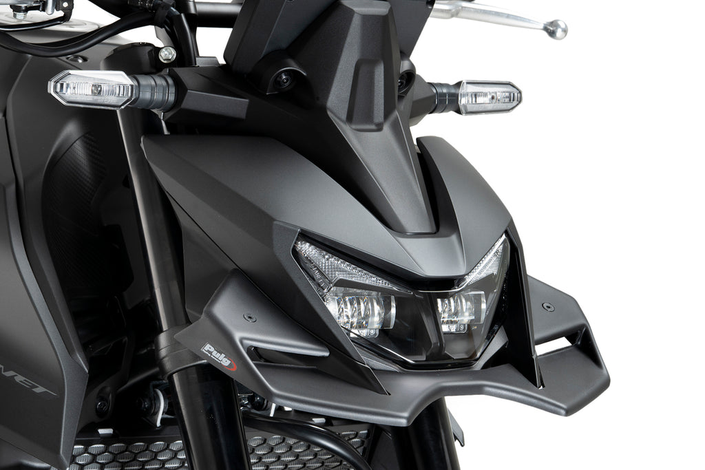 PUIG Downforce front spoiler in matte black, designed for enhanced aerodynamics and sporty look on vehicle body.