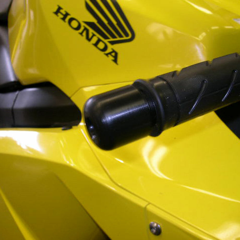 Black Shogun Industries bar end sliders attached to motorcycle handlebars, showcasing durable body protection accessories.