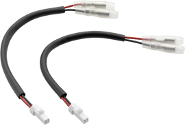 Pair of RIZOMA turn signal cable kits for motorcycle electrical systems, shown with connectors and wiring components.
