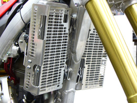 Devol Aluminum Radiator Guard 60-5013 for vehicle, showcasing a sturdy, lightweight metal radiator protection with mounting brackets.