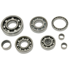 Load image into Gallery viewer, Hot Rods transmission bearing kit for drive applications, showing metal bearings and components in the kit.