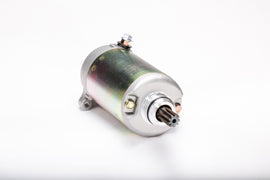Ricks Motorsport Electric starter motor model 27-61702, a compact black automotive starter with wiring connectors.