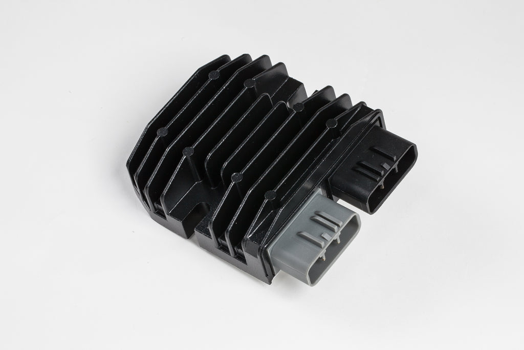 Ricks Motorsport Electric regulator and rectifier for motorcycle electrical systems, shown with wiring connectors and metal casing.