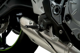 Black PUIG R-Fighter footpegs for motorcycle foot controls, shown on a bike with a sleek, durable design.