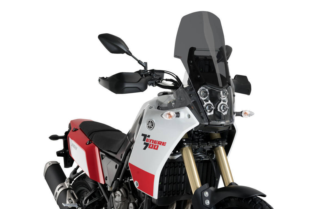 Dark smoke Puig touring windscreen for Yamaha motorcycle, curved windshield with tinted finish, mounted on bike.