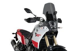 Dark smoke Puig touring windscreen for Yamaha motorcycle, curved windshield with tinted finish, mounted on bike.