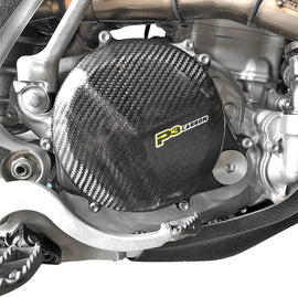 P3 Carbon Fiber Clutch Cover for Honda CRF450R/RX motorcycle, lightweight body part with sleek carbon fiber finish.