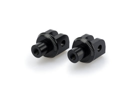 PUIG Footpeg Adapter for motorcycle foot controls, black metal with mounting hardware visible in the image.