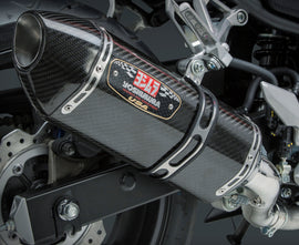 Yoshimura R-77 slip-on exhaust with stainless steel and carbon fiber finish, designed for motorcycle performance and style.