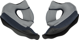 Fly Racing Odyssey Cheek Pads in grey and black, motorcycle helmet padding, showing close-up of the cushioned interior.