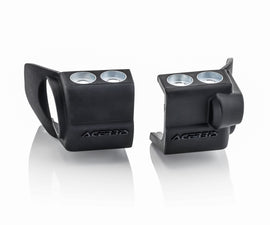 Acerbis black fork shoe for RMZ250/450 motocross bikes, durable motorcycle suspension component with brand logo visible.