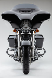 Chrome Cobra Case Guard body for FLH 14-24 models, part number 82-96556, shown on a motorcycle.