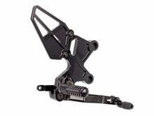 Load image into Gallery viewer, VORTEX rear set foot controls in black for Kawasaki, featuring durable foot pegs and shift/brake levers for motorcycle riding.