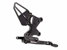 VORTEX rear set foot controls in black for Kawasaki, featuring durable foot pegs and shift/brake levers for motorcycle riding.