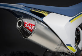 Yoshimura RS-4 exhaust header, canister, and end cap system in stainless steel, aluminum, and carbon fiber with polished finish.