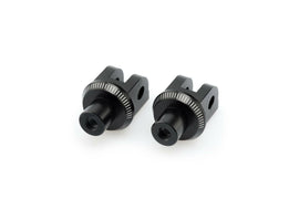 PUIG footpeg adapter 561-06347BK for motorcycle foot controls, black metal with mounting hardware visible in the image.