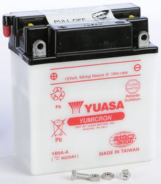Yuasa YB9A-A conventional car battery, model 49-1828, with positive and negative terminals visible on top.