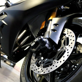 Black Shogun Industries front axle sliders for body protection on motorcycles, model 71-1868.