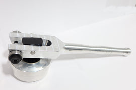 Ibexx Belt Removal Tool Sil Can 23-1431, close-up of the black plastic tool for removing belts, shown on a white background.