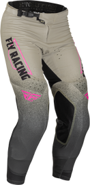 Fly Racing Evolution DST pants in ivory and black, size 32, featuring durable fabric and adjustable waistband for motocross riding.