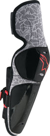 Alpine Star Vapor Pro youth elbow protectors in black and grey, featuring padded armor for sports safety.