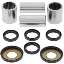 Load image into Gallery viewer, All Balls swingarm bearing kit for motorcycle suspension, showing bearings and components arranged for installation.