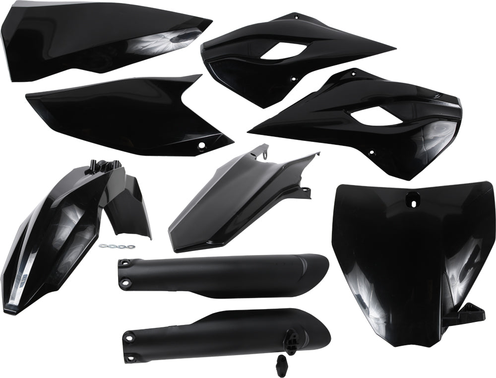Black Acerbis plastic kit with various molded plastic parts arranged on a surface.