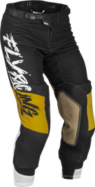 Fly Racing Evolution DST L.E. Brazen motocross pants in white, gold, and black, size 34, featuring durable racing gear design.