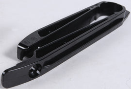 Acerbis black chain slider for motorcycle, showing close-up of durable plastic component with brand logo and mounting details.