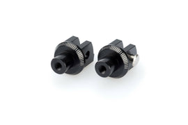 Black PUIG footpeg adapter for rider foot controls, shown with mounting details on motorcycle footpeg assembly.