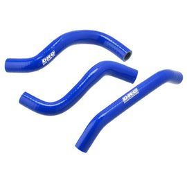 DRC Radiator Hose Kit Hus Blue for engine, featuring flexible hoses with blue coloring, designed for cooling system connections.