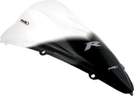 Clear PUIG Racing Windscreen 561-1407 mounted on a motorcycle, showing aerodynamic design and transparent protective material.