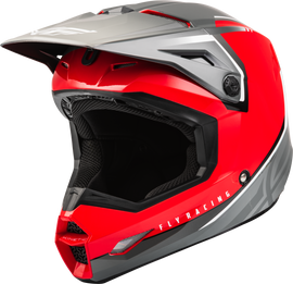 Fly Racing Youth Kinetic Vision Helmet in red and grey, featuring a sleek aerodynamic design and adjustable straps.