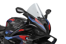 Load image into Gallery viewer, Clear PUIG R-Racer windscreen for BMW motorcycle, showing transparent windscreen with mounting edges and branding details.