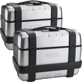 Pair of GIVI Trekker side cases for motorcycle luggage, 46L capacity, featuring black hard-shell design and metal latch closures.