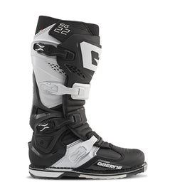 Black and white GAERNE SG22 boots in size 10 footwear with sleek design and sturdy construction, suitable for outdoor use.