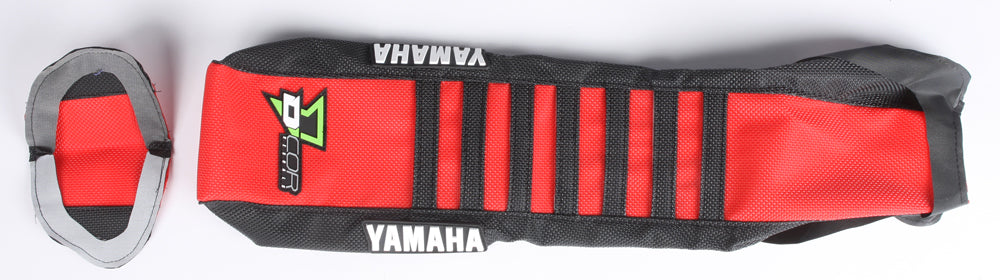 DCOR black and red seat cover with black accents, designed for vehicle seats, featuring a sleek, sporty look.