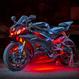 Red LED strip light kit from XK Glow with 10 flexible strips, shown on a white background for automotive or decorative use.