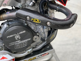 P3 Heat Shield Carbon Fiber exhaust heat shield with sleek black finish and textured carbon fiber surface.