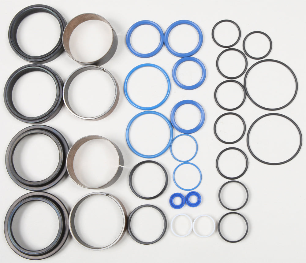 Pivot Works suspension seal and bushing kit for forks, featuring various seals, bushings, and components on a clean background.