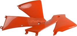 Polisport Plastics orange radiator shroud body for motocross bikes, featuring a sleek, durable design with ventilation openings.