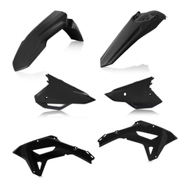 Acerbis black plastic body kit for motorcycle, includes various panels and fairings with Acerbis branding visible.