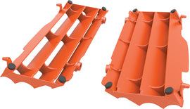 Polisport Plastics radiator louvers in bright orange for off-road bikes, model 64-56520, showing close-up of the plastic vent slats.