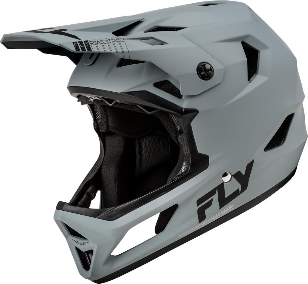 Fly Racing Rayce bicycle helmet in matte grey with adjustable straps and ventilation, designed for safe cycling.