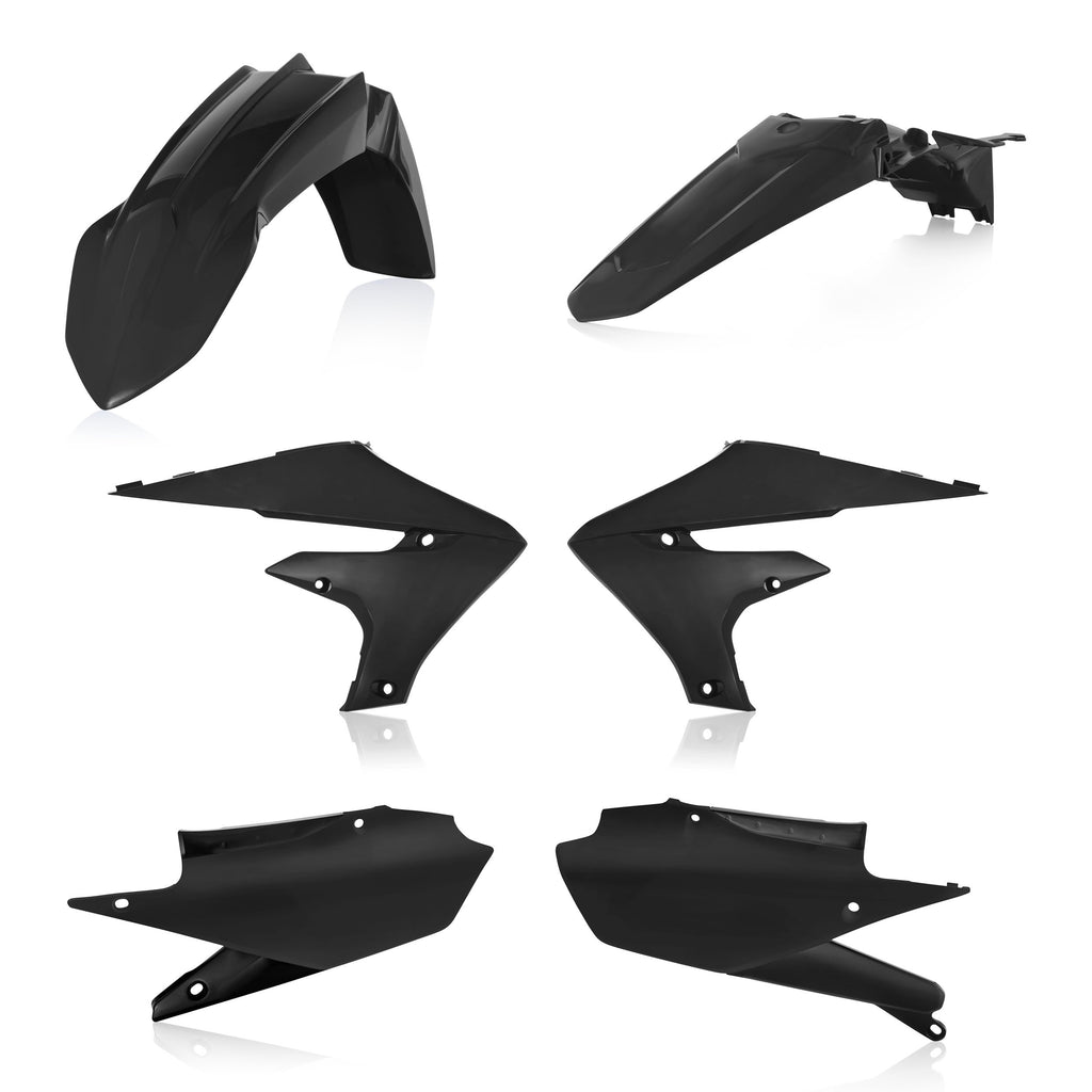 Acerbis black plastic kit with various motorcycle parts, including fenders and panels, arranged on a white background.