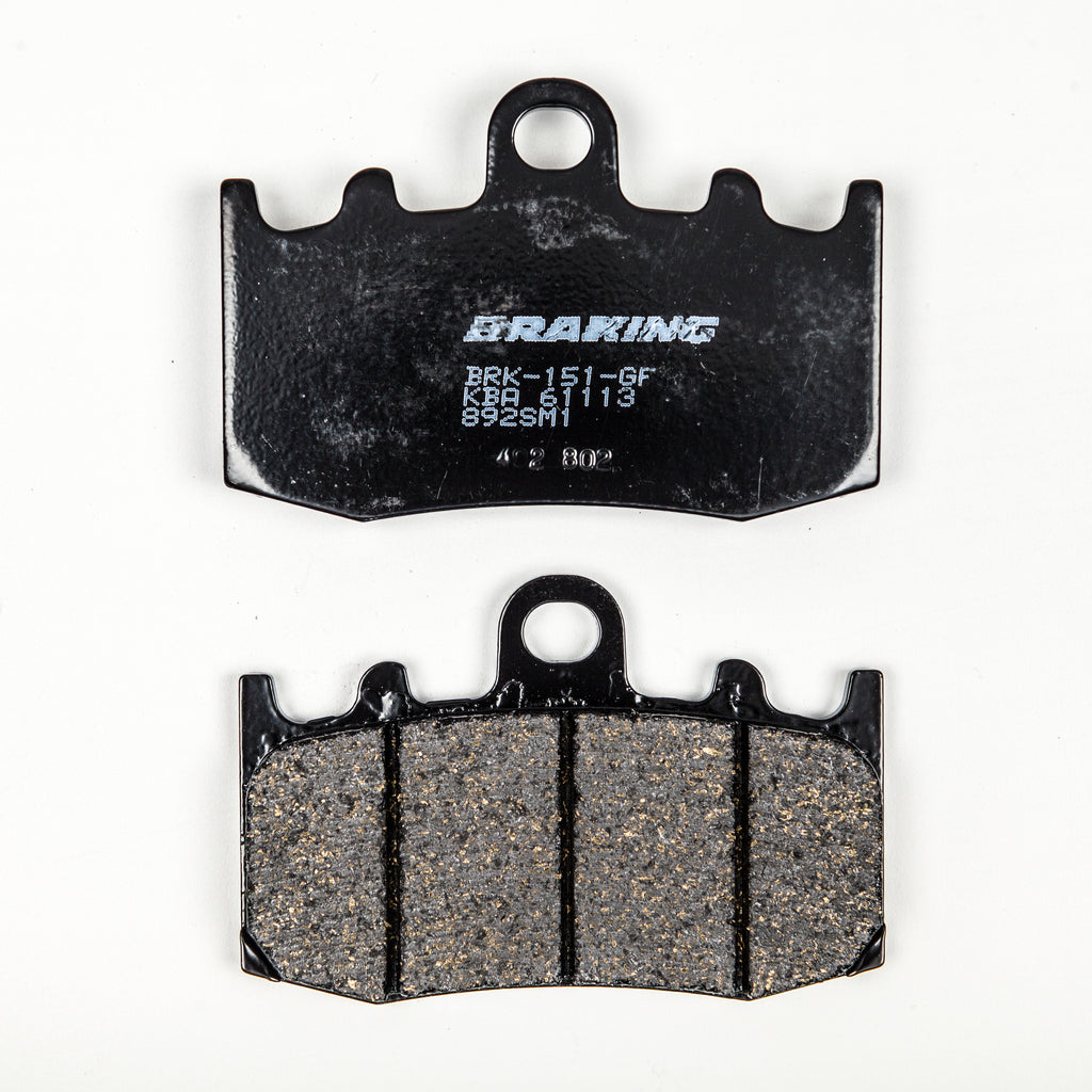 Braking semi-metallic brake pad set 31-892S installed on a vehicle brake rotor, showing the detailed pad surface and mounting hardware.
