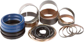 Pivot Works suspension seal and bushing kit for forks, showing components and packaging for bike maintenance and repair.