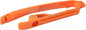 Polisport Plastics orange 2-stroke chain slider drive component for motorcycle, with detailed design and branding visible.