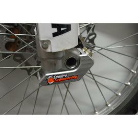 Enduro Engineering right side fork guard for motorcycle suspension, durable protective guard with brand branding visible